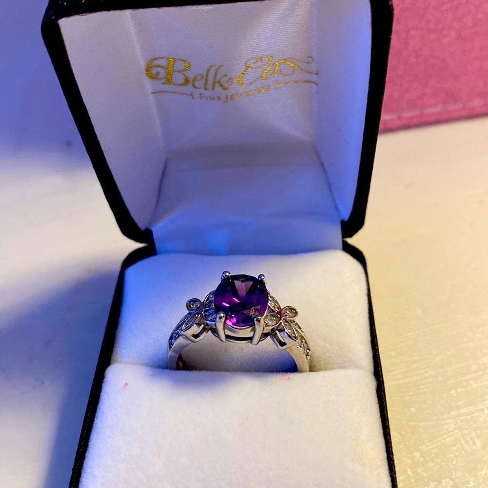 Ss  925 ring w purple cz white topaz on sides